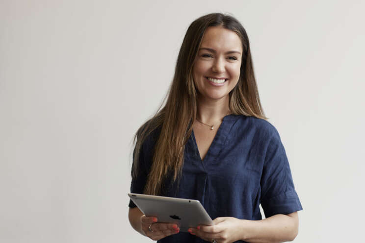Woman with iPad.
